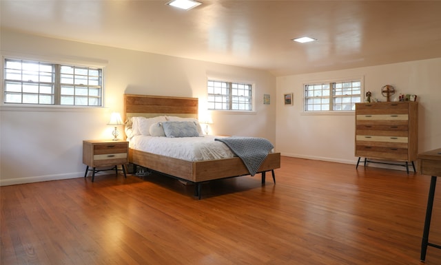 bedroom featuring wood-type flooring