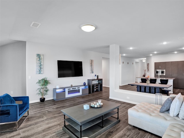 living room with hardwood / wood-style floors