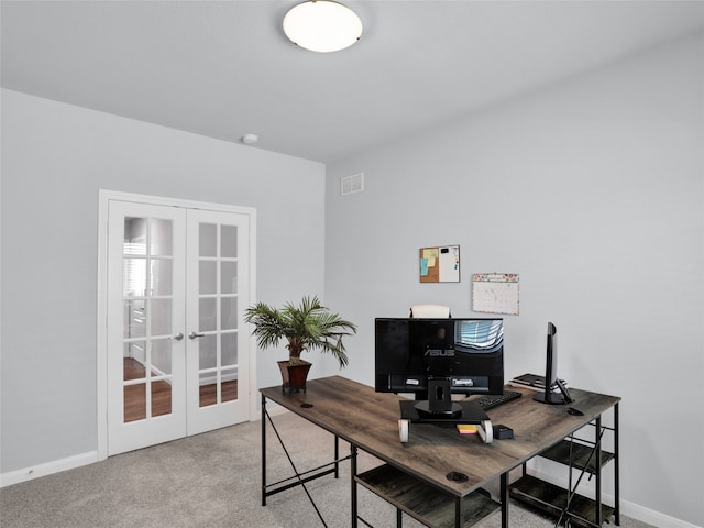 home office with french doors and carpet flooring