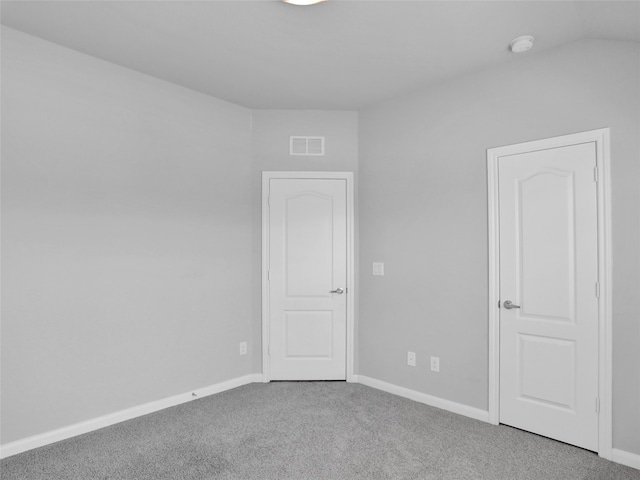 unfurnished room with carpet flooring