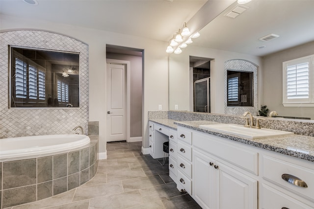 bathroom featuring vanity, tile patterned floors, and independent shower and bath