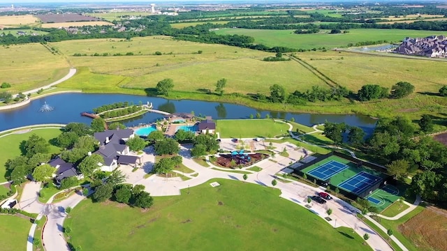 drone / aerial view featuring a water view and a rural view