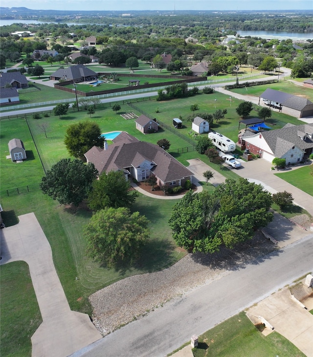 aerial view with a water view and a residential view