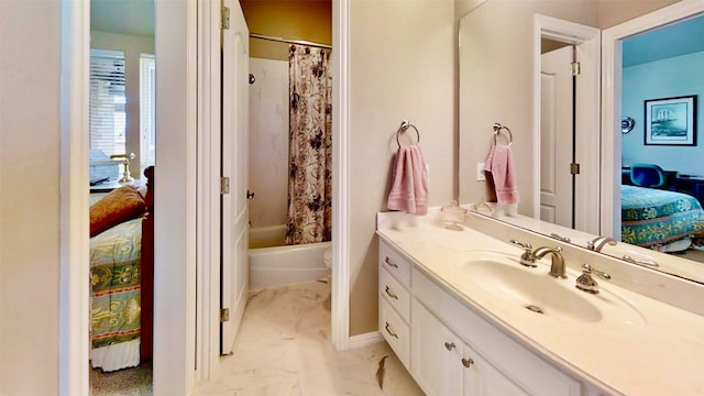 bathroom with marble finish floor, shower / bathtub combination with curtain, toilet, ensuite bathroom, and vanity