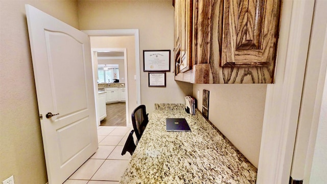 bathroom with tile patterned floors