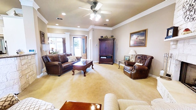 living area with light carpet, ornamental molding, a fireplace, and visible vents