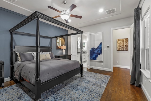 bedroom with dark wood-type flooring and ceiling fan