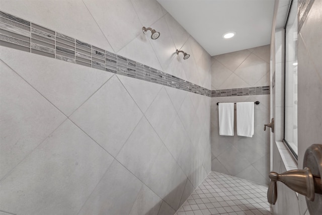 bathroom with tiled shower