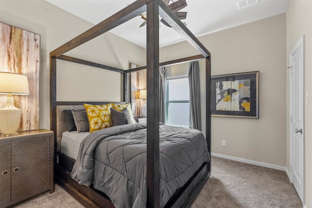 carpeted bedroom featuring ceiling fan