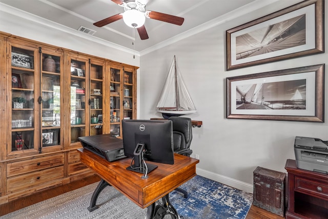 office space featuring ceiling fan, hardwood / wood-style flooring, and ornamental molding