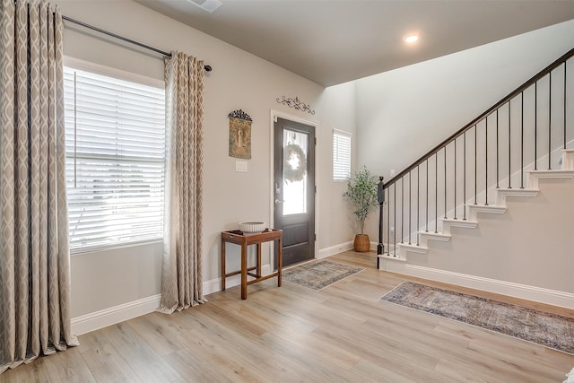 entrance foyer featuring light hardwood / wood-style floors