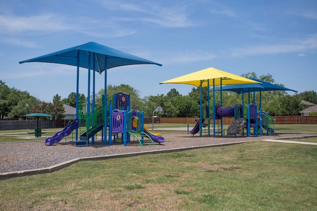 view of playground with a yard