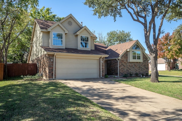 view of front of home with a garage and a front lawn