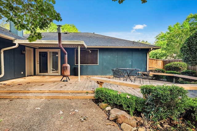 rear view of property with a deck