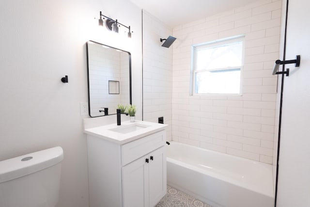 full bathroom with tiled shower / bath combo, vanity, and toilet