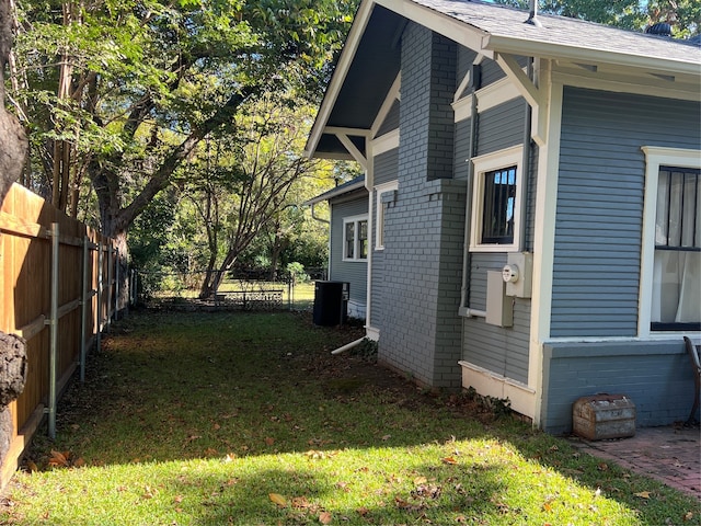 view of home's exterior featuring a yard