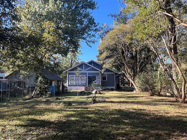 view of front of home with a front lawn