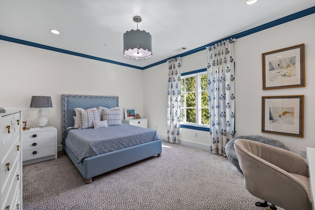 carpeted bedroom featuring ornamental molding