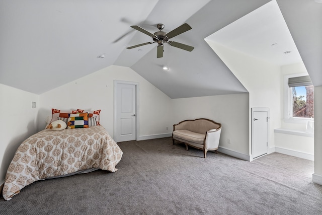 bedroom with ceiling fan, carpet flooring, and vaulted ceiling