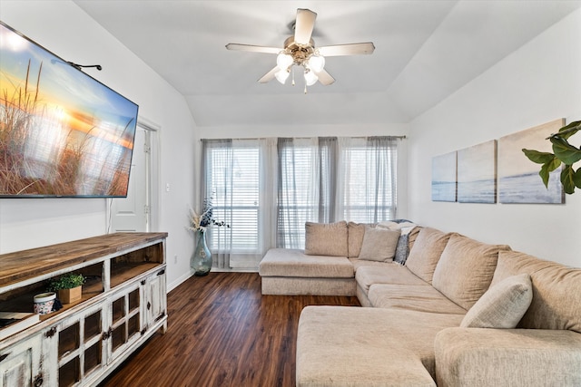 living room with dark hardwood / wood-style flooring, lofted ceiling, and ceiling fan