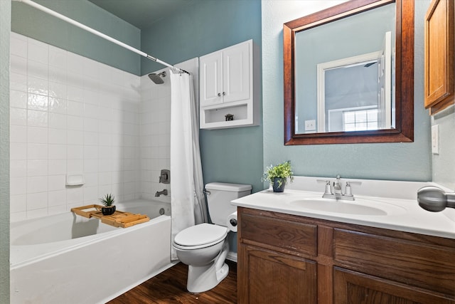 full bathroom featuring hardwood / wood-style floors, vanity, toilet, and shower / bath combination with curtain