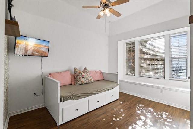 bedroom featuring ceiling fan and dark hardwood / wood-style floors