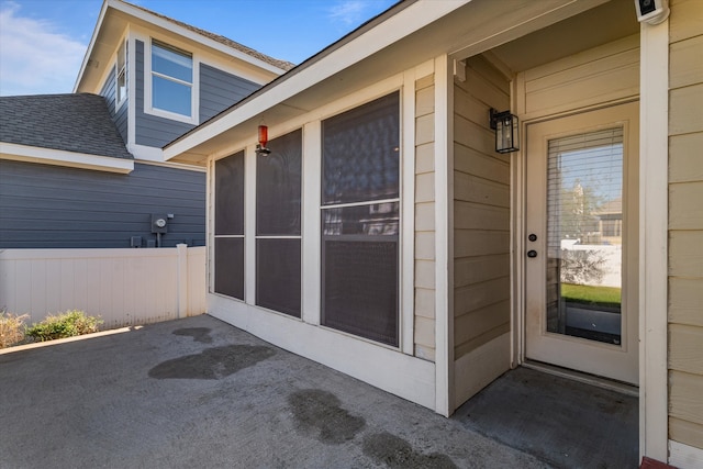 property entrance featuring a patio area