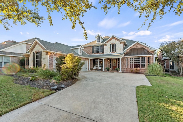 front of property featuring a garage and a front lawn