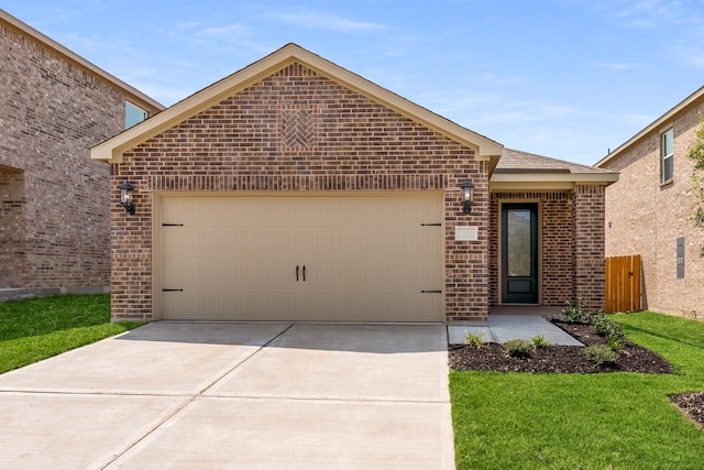 view of front facade featuring a garage and a front lawn