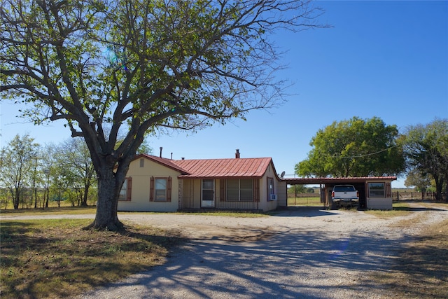 view of front of house featuring a carport