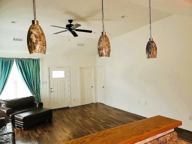 sitting room featuring dark hardwood / wood-style flooring, lofted ceiling, and ceiling fan