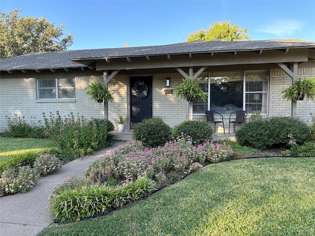 view of front of home with a front lawn