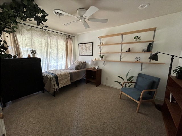 bedroom featuring ceiling fan and light colored carpet