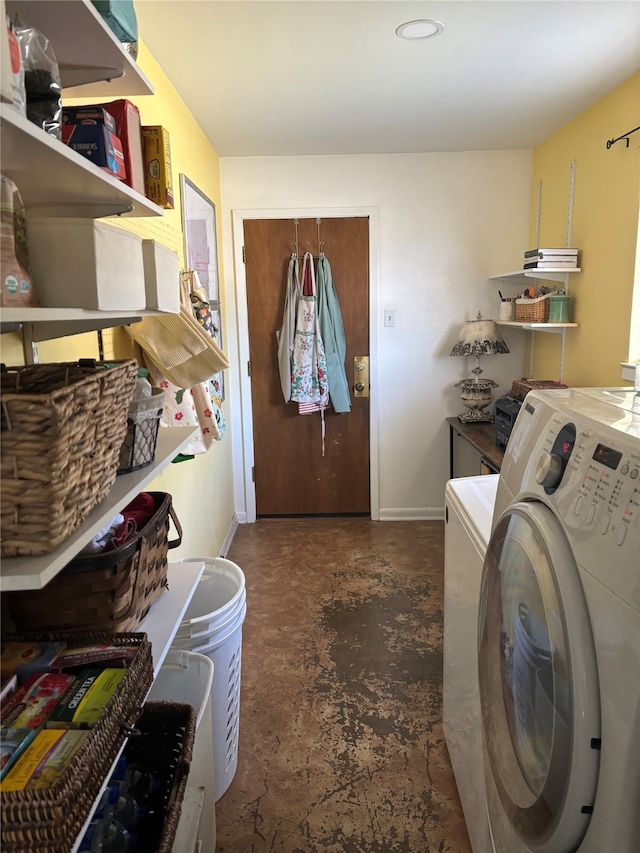 washroom with washer / clothes dryer