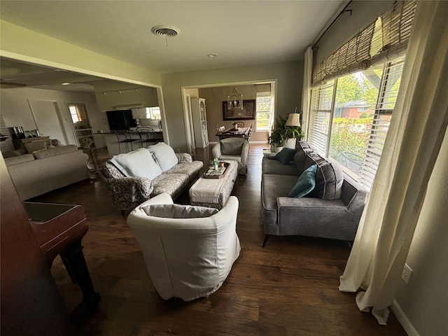 living room featuring dark hardwood / wood-style floors