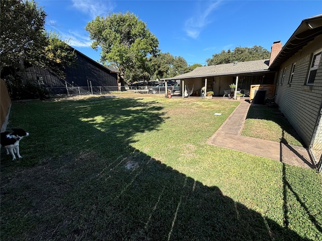 view of yard with a patio area