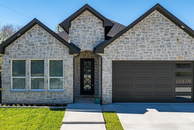 view of front of property with a garage