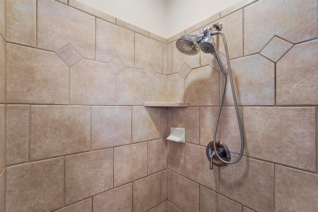 room details with a tile shower