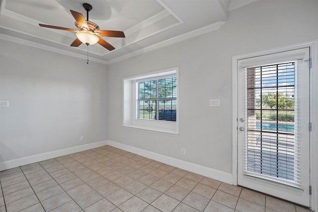 unfurnished room featuring a healthy amount of sunlight, ceiling fan, and light tile patterned flooring