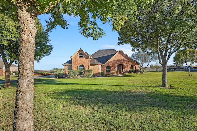 view of front of home with a front lawn