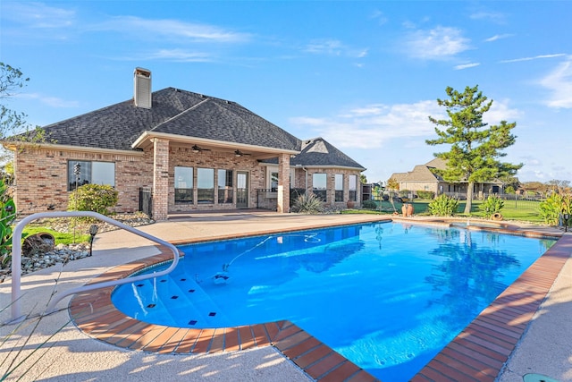 view of swimming pool featuring a patio