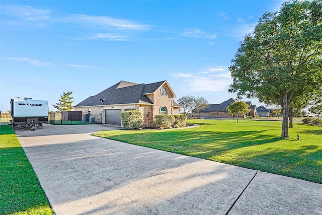 view of front facade featuring a garage and a front lawn