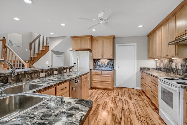 kitchen featuring sink, stainless steel dishwasher, ceiling fan, light wood-type flooring, and white electric range