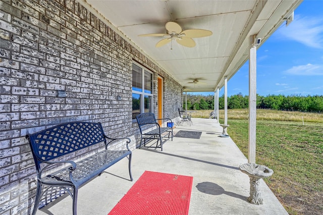 view of patio featuring ceiling fan