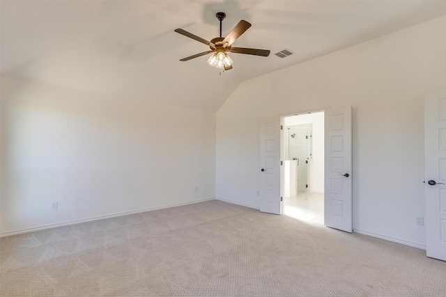 interior space featuring lofted ceiling and ceiling fan