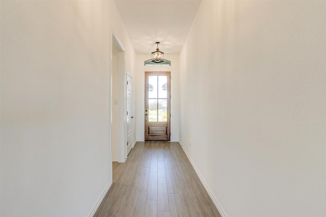 doorway with light hardwood / wood-style floors