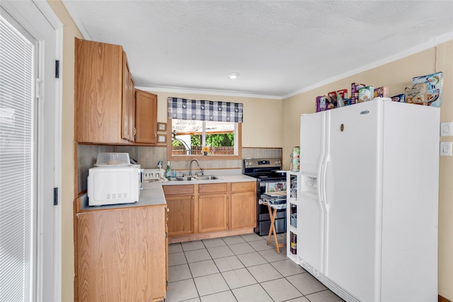 kitchen featuring backsplash, white appliances, sink, and light tile patterned floors