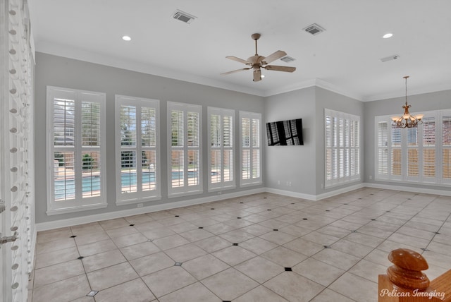 tiled spare room featuring ornamental molding and ceiling fan with notable chandelier