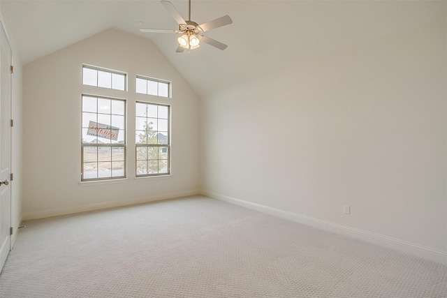 bonus room featuring baseboards, light colored carpet, ceiling fan, and high vaulted ceiling