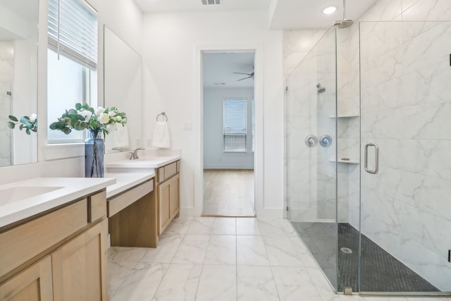 bathroom with walk in shower, vanity, and ceiling fan